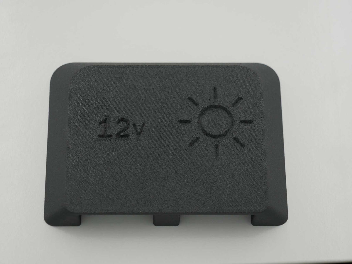 black Dual Anderson Mount cover with 12v and sun icons embossed, durable UV-resistant ASA-Glass Fibre material