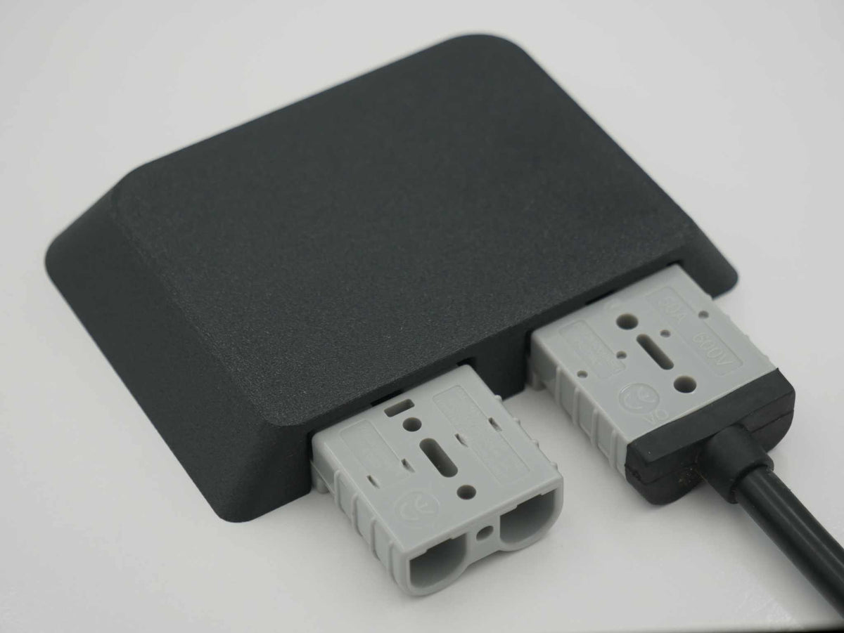 Dual Anderson Mount with two 50amp Anderson plugs in a black durable ASA-Glass Fibre housing designed for canopy or structure mounting