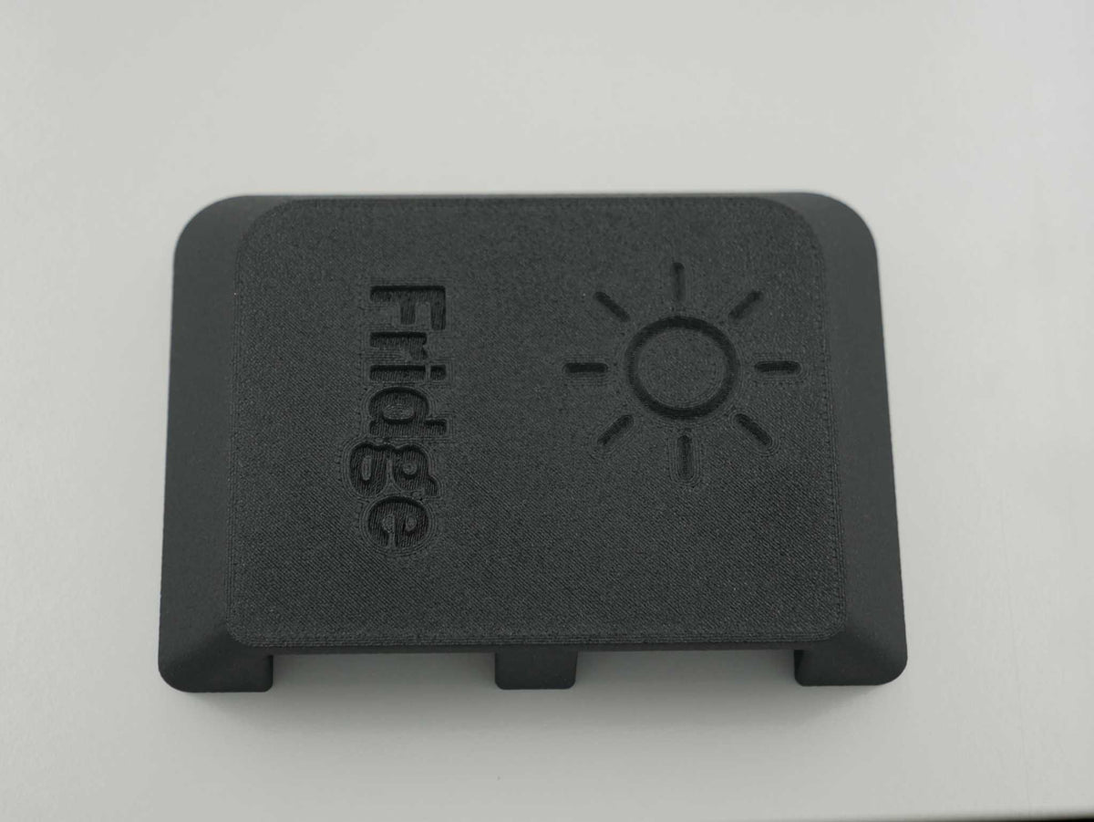 Dual Anderson Mount cover with Fridge and Solar text and sun icon embossed on black ASA-Glass Fibre material