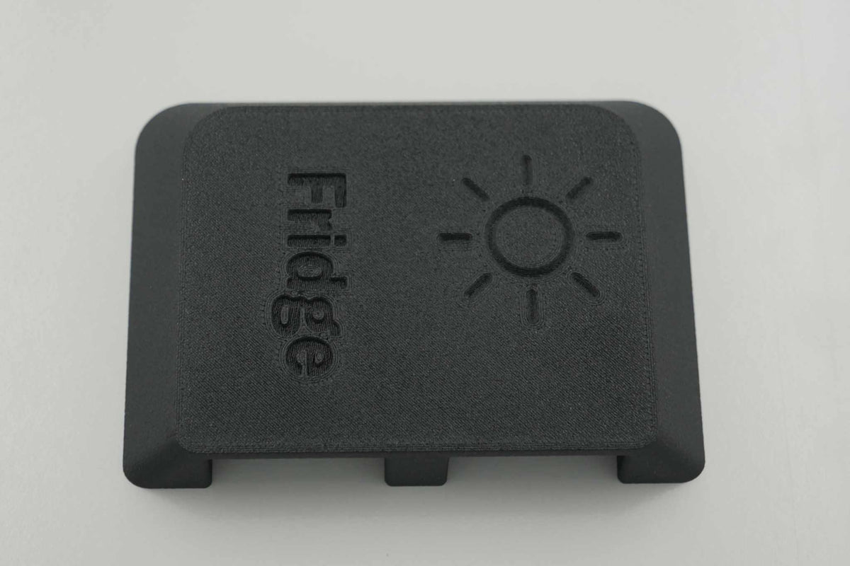 Dual Anderson Mount cover labelled Fridge, made of tough black UV resistant ASA-Glass Fibre material