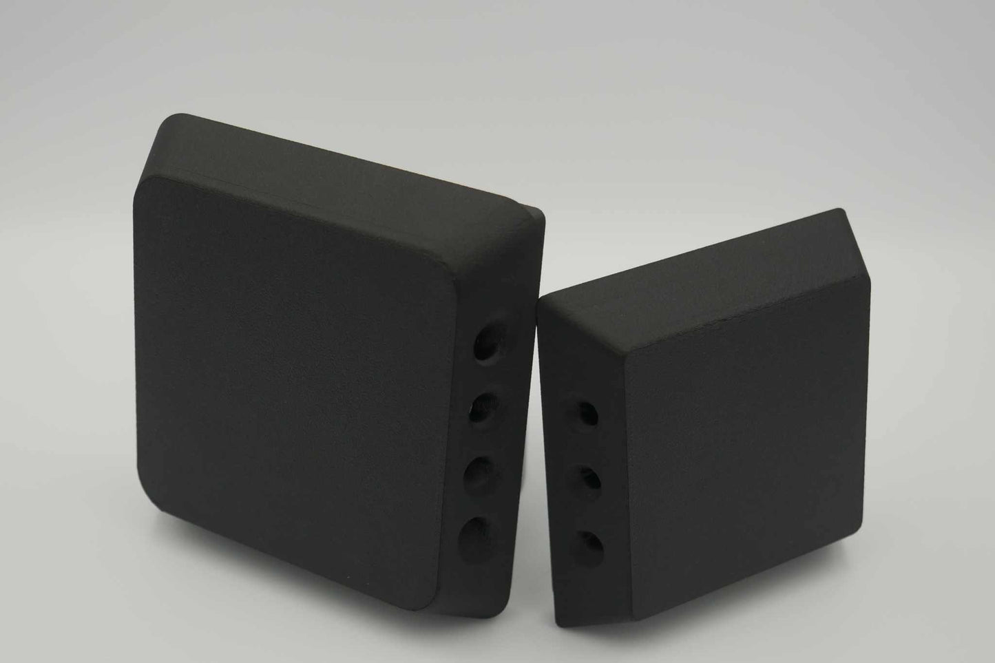 Black compact filtered air vent for vertical rear canopy mounting with multiple side openings