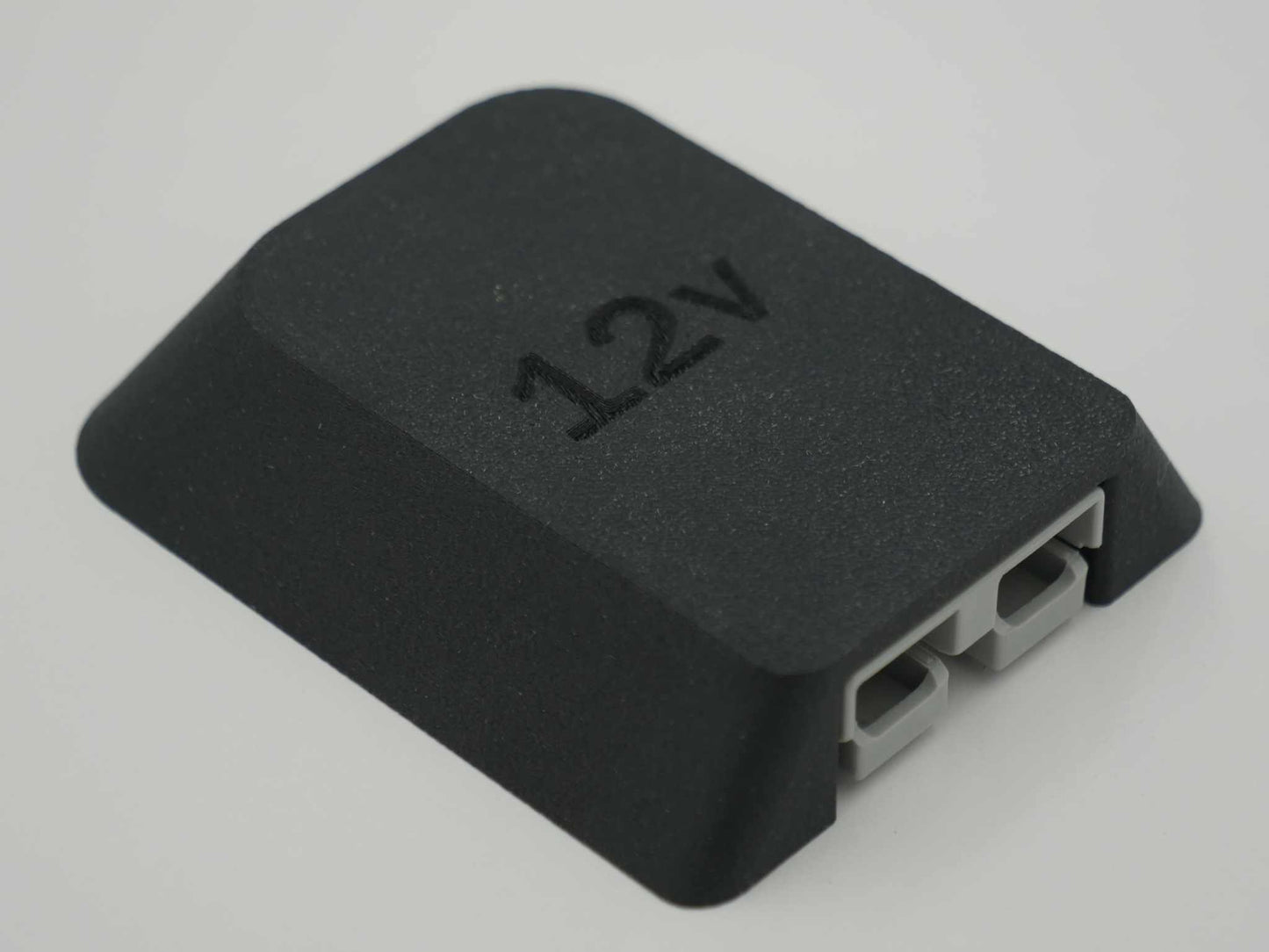 12v Single Anderson Mount plug cover made from tough UV resistant ABS-glass fiber with integrated 50amp Anderson plug and 4 mounting bolt holes