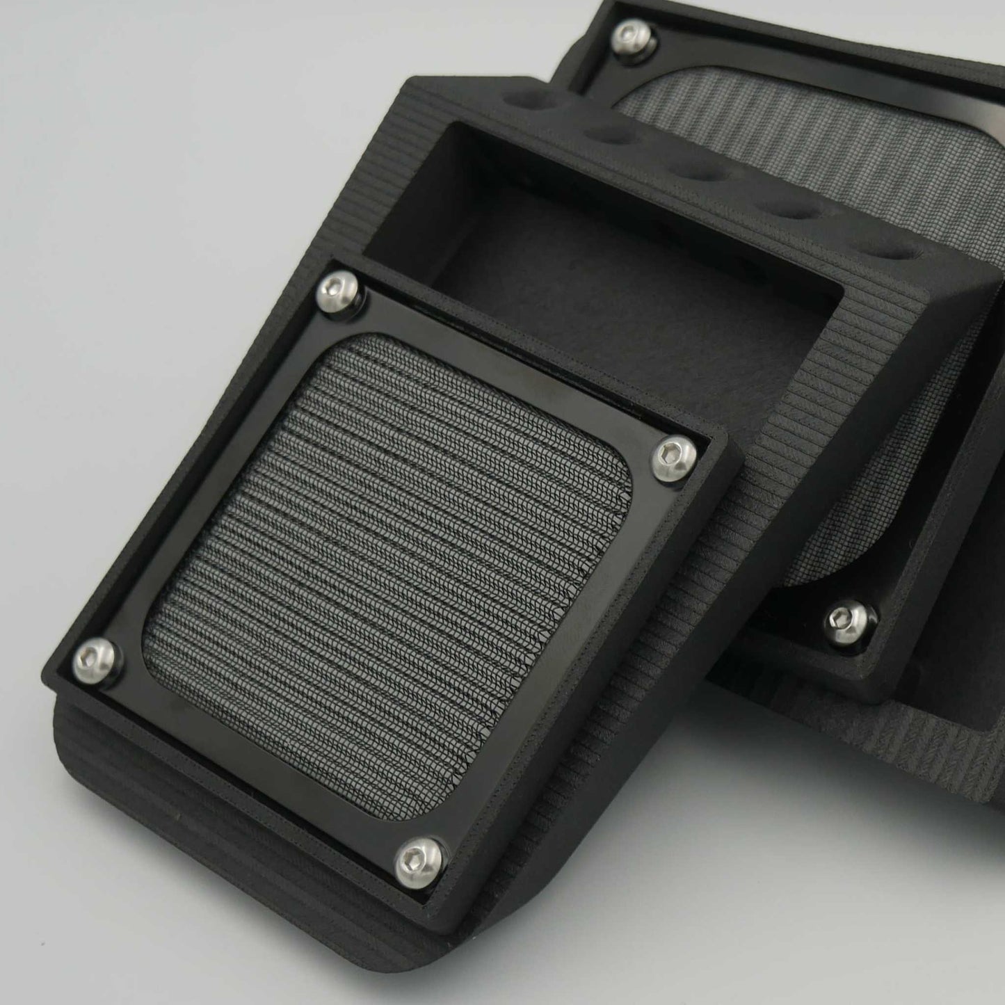 Slanted Mini filtered air vent with black ASA-CF or ABS-GF material, sleek angular design for rear canopy mounting with integrated screen and filter