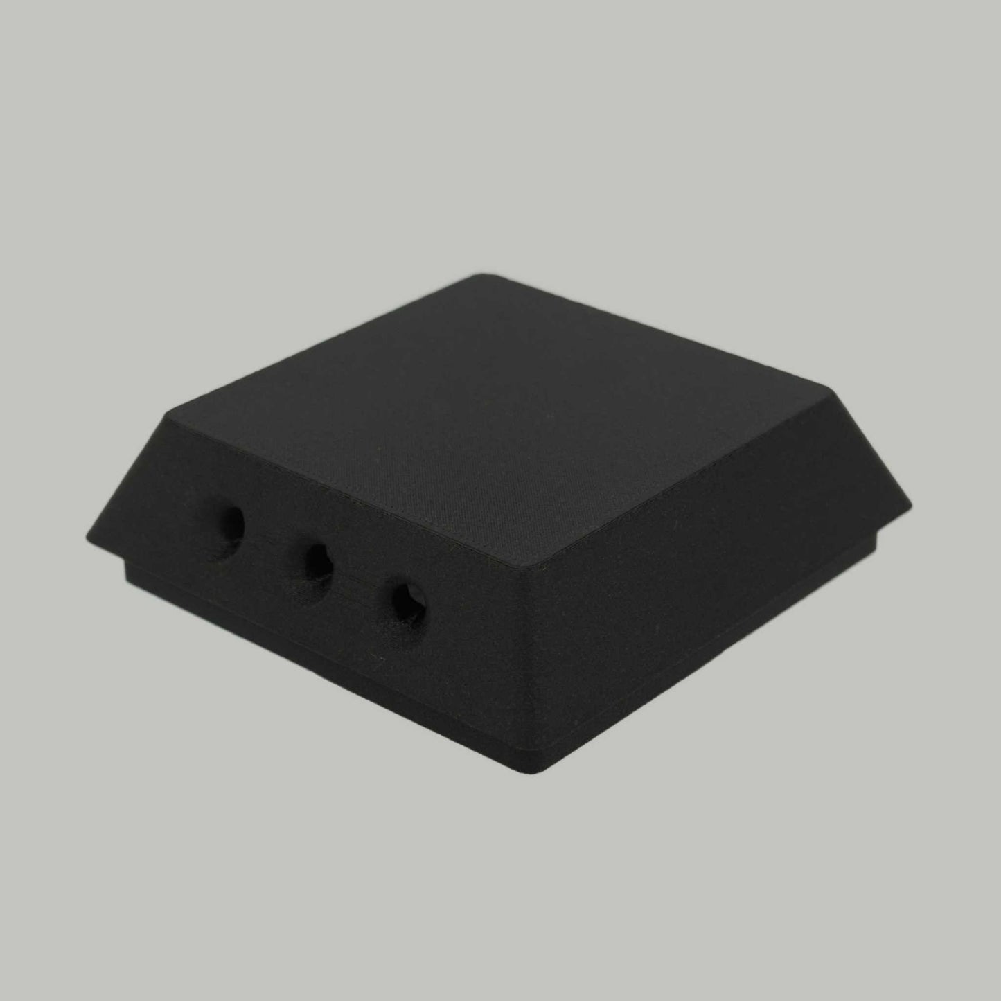 Compact black filtered air vent for rear mounting, made from ASA-CF or ABS-GF, designed for passive hot air circulation.