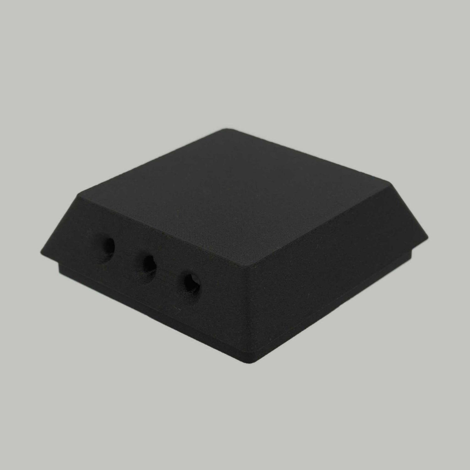 Compact black filtered air vent for rear mounting, made from ASA-CF or ABS-GF, designed for passive hot air circulation.