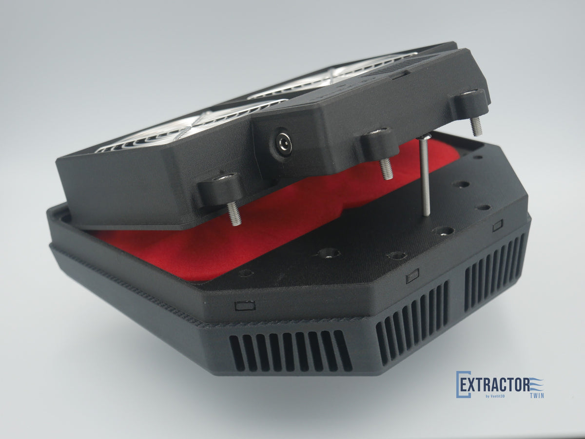 The Extractor Twin fan box tilted up on its hinge to reveal the red 10mm Uni foam filter