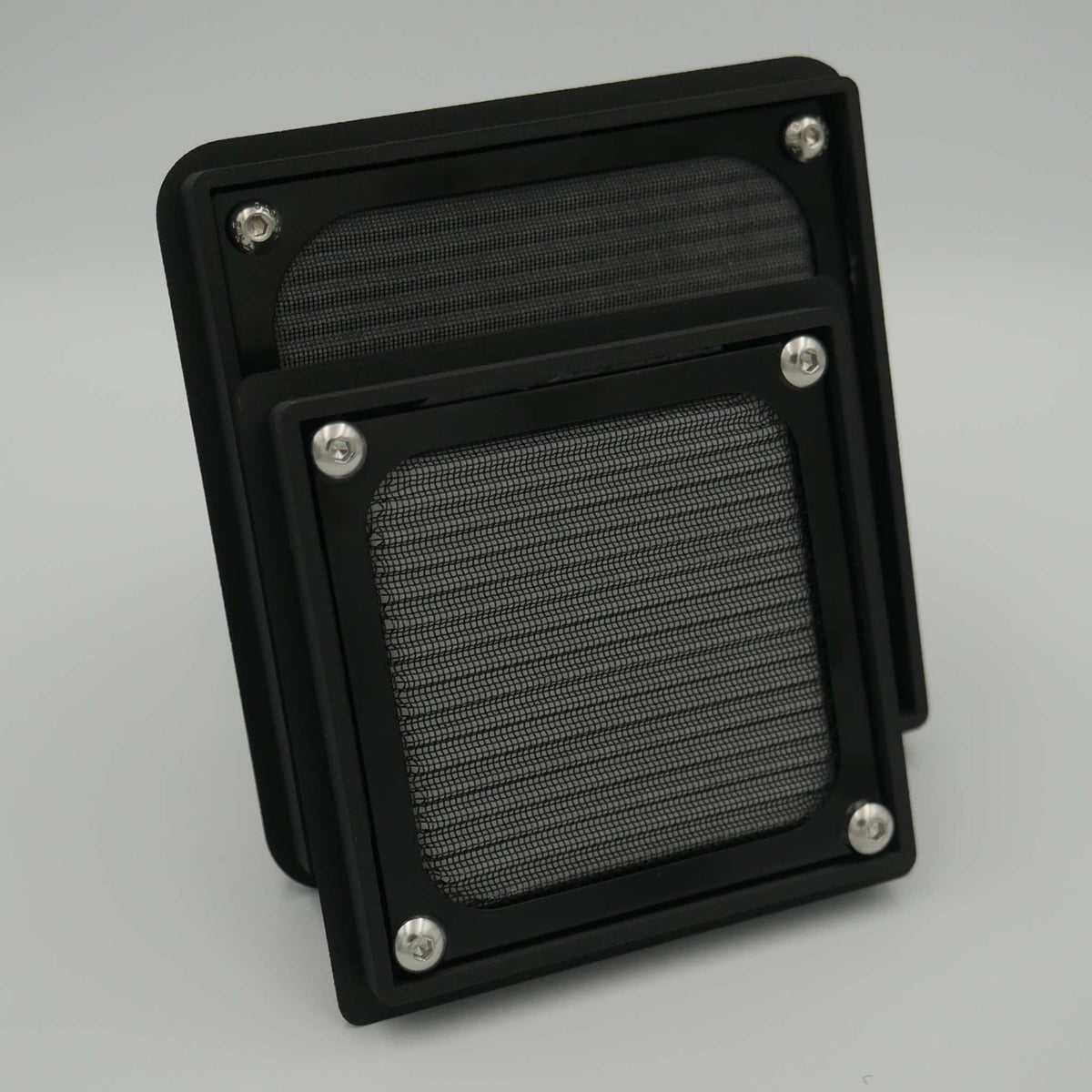 Black filtered air vent for rear mounting on canopies, compact design with stainless steel bolts and screen filter included
