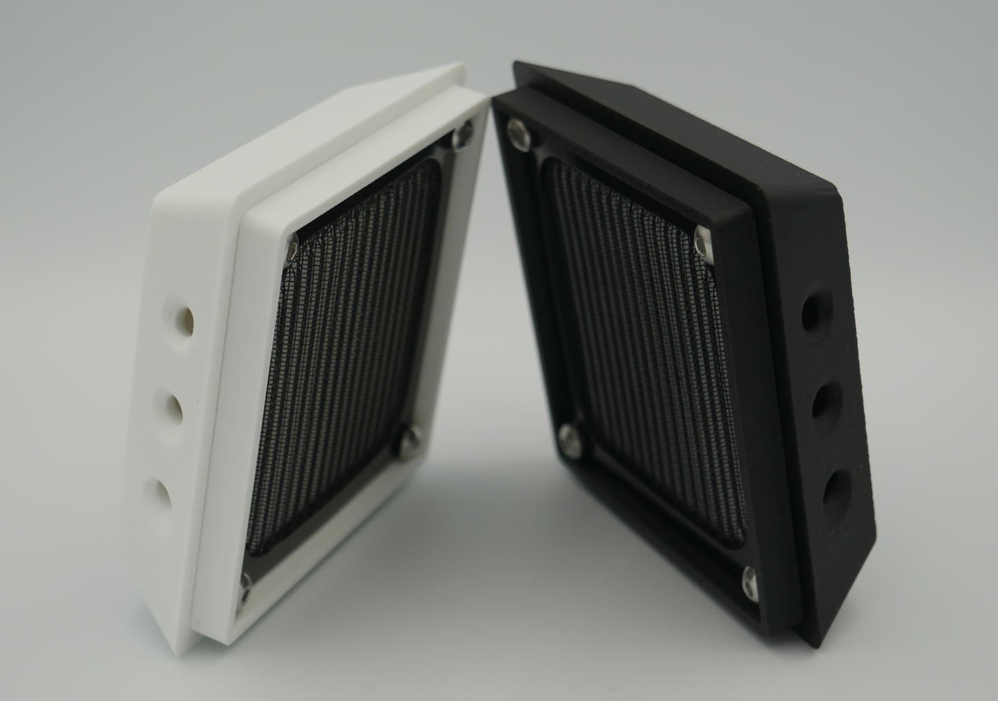 Compact filtered air vents in white and black with mesh screens for rear canopy mounting