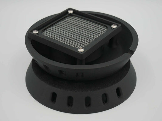 Black circular canopy vent with square metal mesh screen and mounting holes for ute canopies