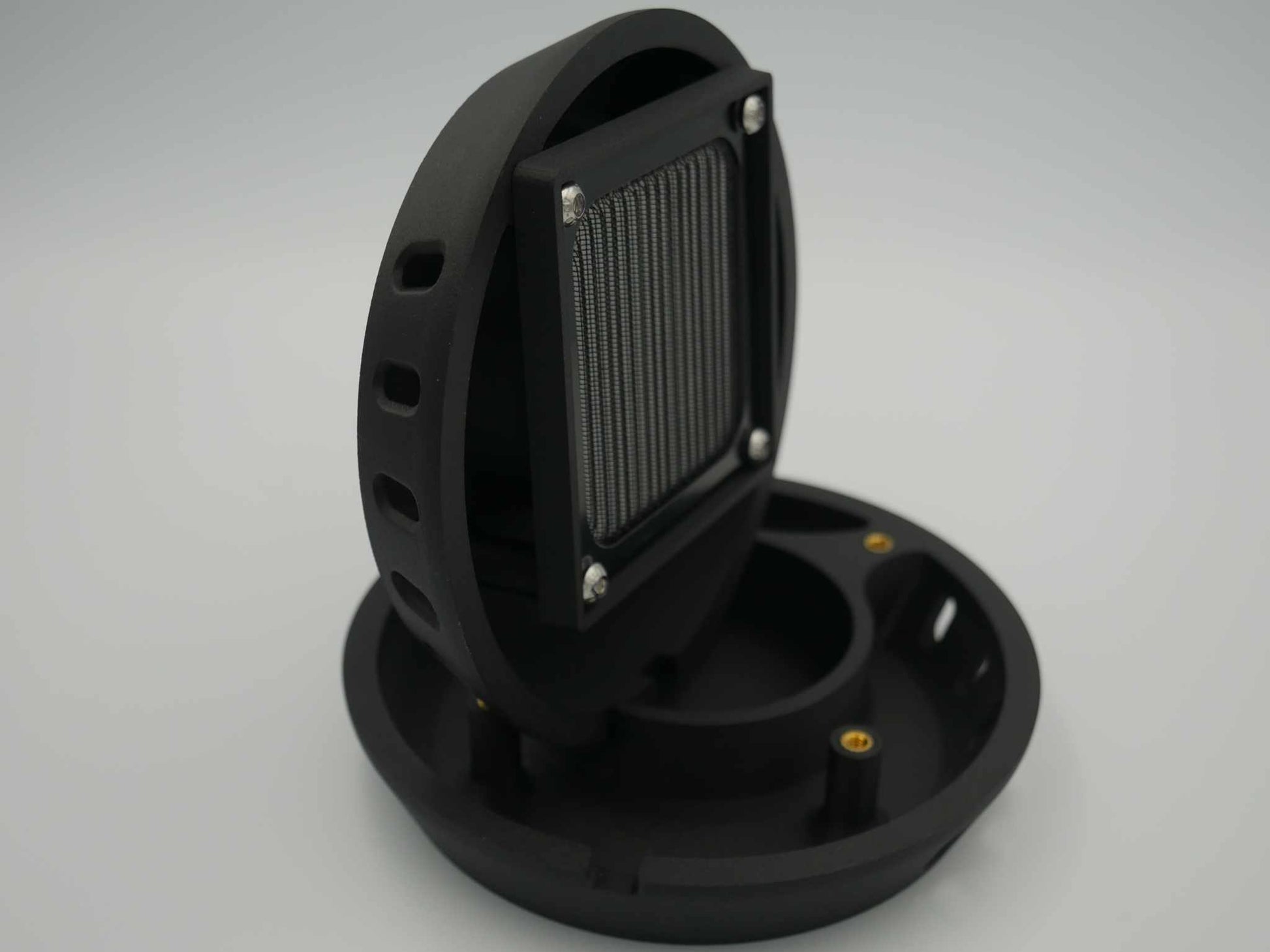 Circular black canopy vent with square filtered air intake, made from UV resistant ASA-Carbon Fiber or ABS-Glass Fiber materials.