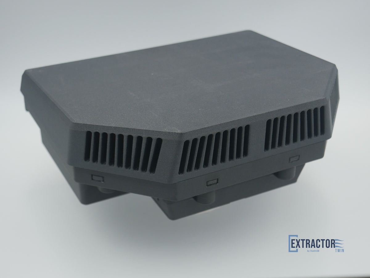 The Extractor Twin outer vent housing in black ASA glass fibre with downward facing louvres