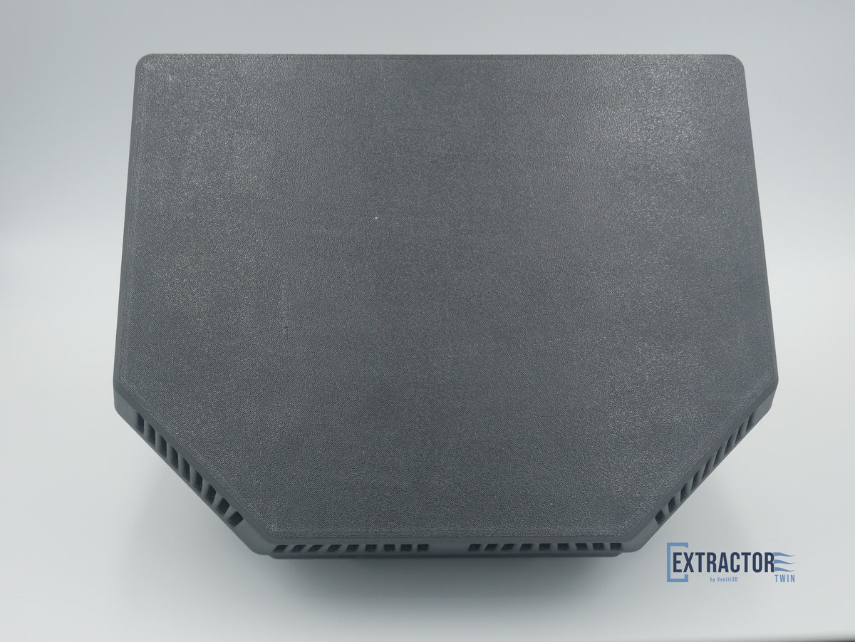 The Extractor Twin outer housing from above, slim 42mm profile tapering toward the top