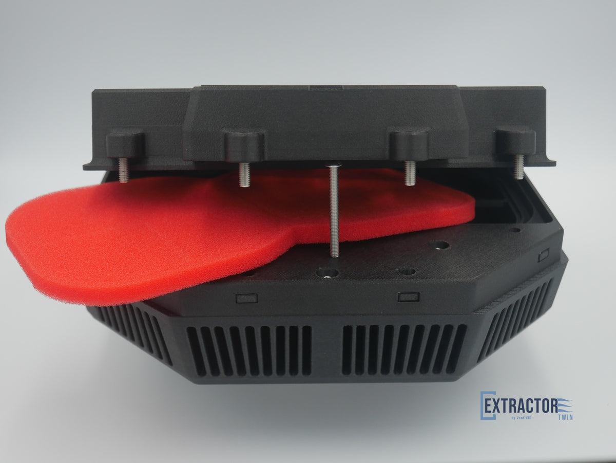 The Extractor Twin quick filter change, washable Uni filter sliding out from under the hinged fan box