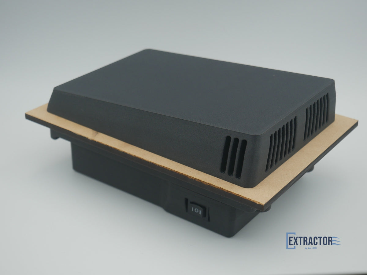 Low-profile outer housing of The Extractor 12V canopy vent with downward-facing louvres, fitted through a panel