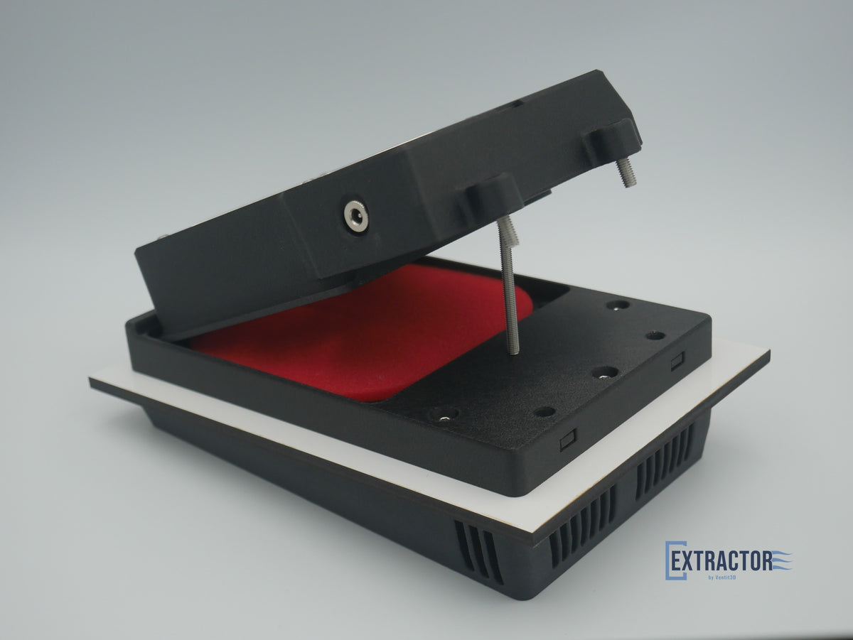The Extractor 12V canopy vent with the fan box tilted up on its hinge, showing the red Uni foam filter for a quick filter change